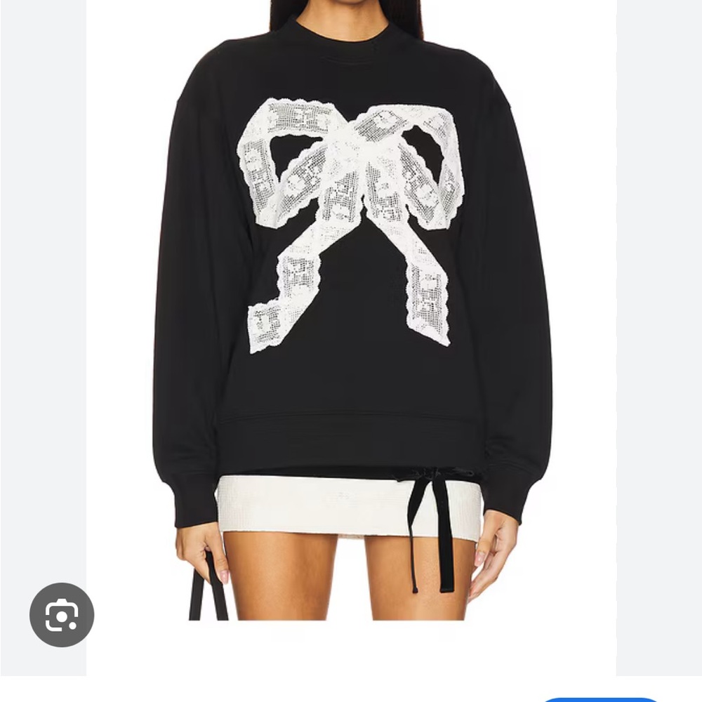 Elegant Black Crewneck Sweater with White Lace Design